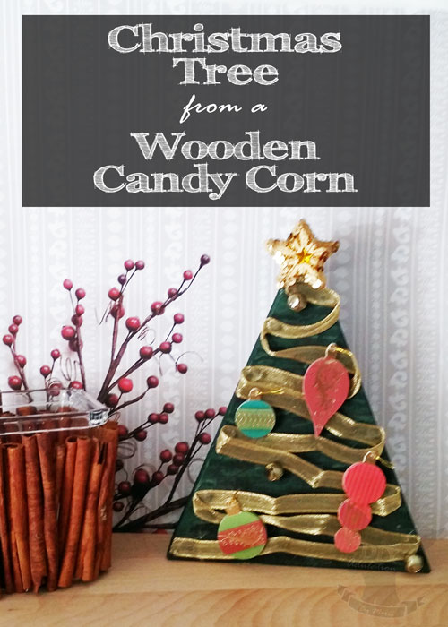 Re-purpose your holiday decor and make this Christmas tree from a wooden candy corn!