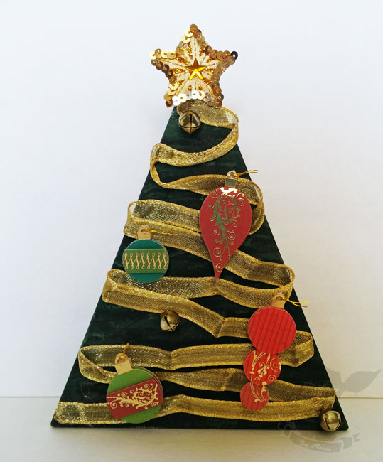 Re-purpose your holiday decor and make this Christmas tree from a wooden candy corn!