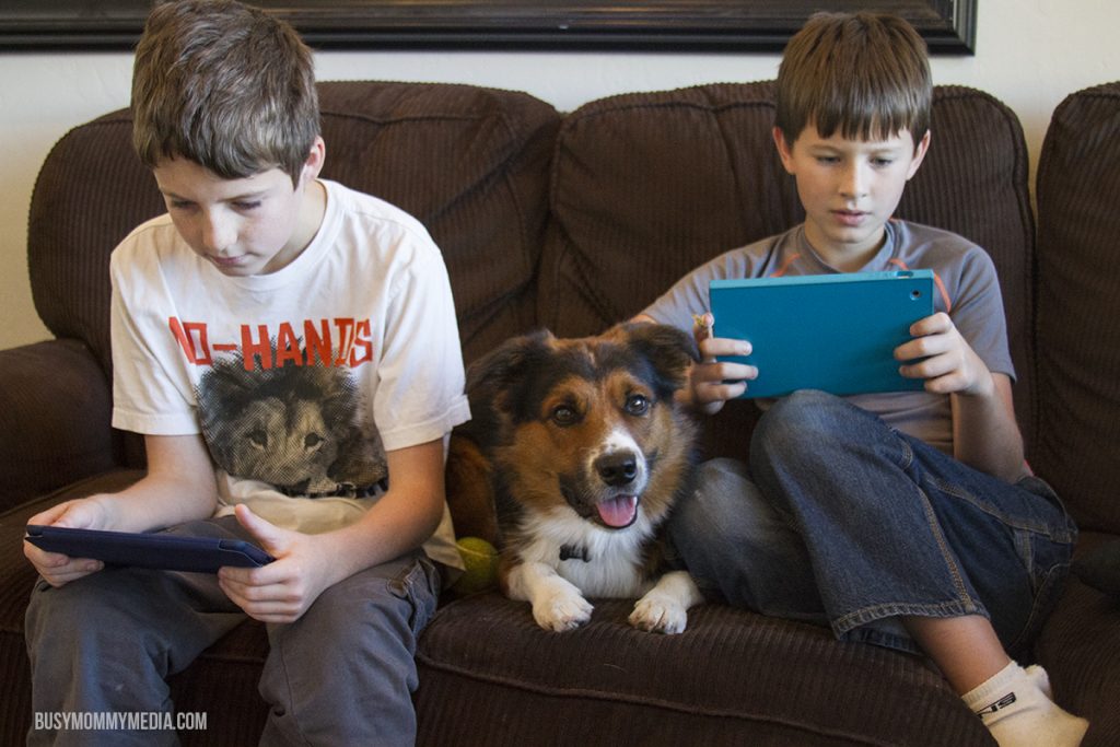 kids playing on iPads
