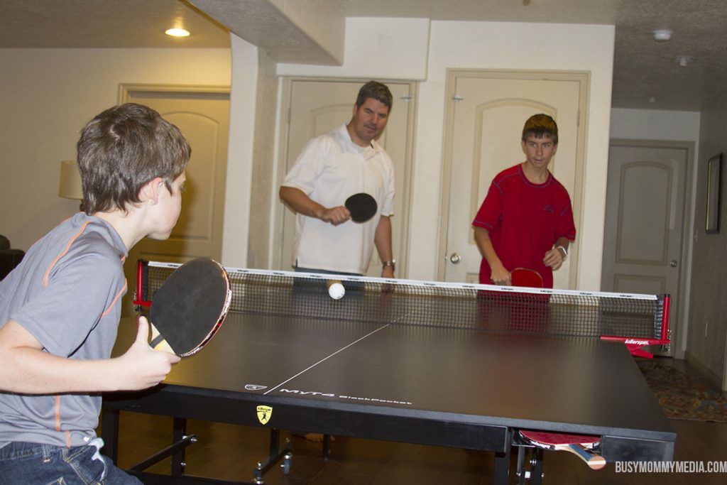 family playing ping pong