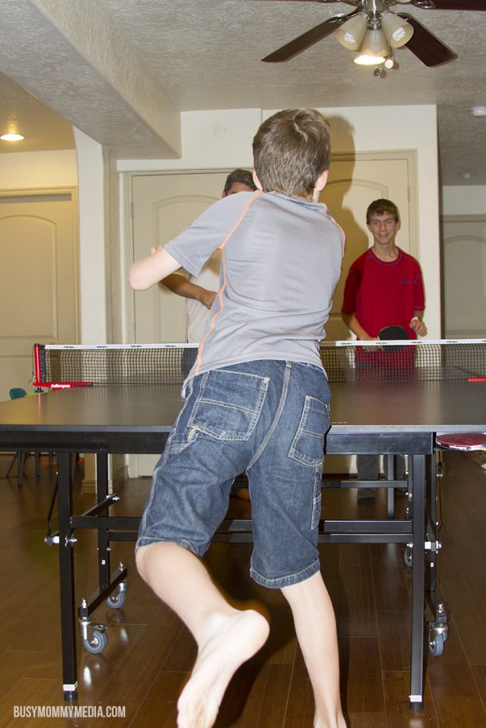 family playing ping pong